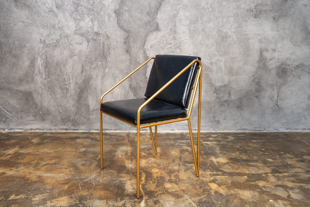 Chair with armrests on gold frame, black seat — photo 5