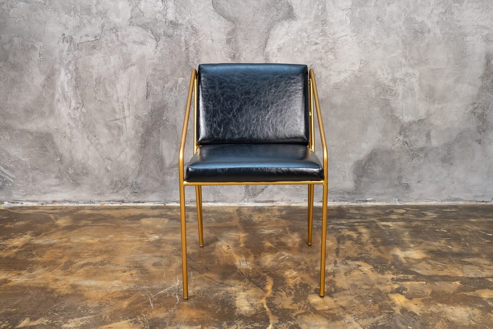 Chair with armrests on gold frame, black seat — photo 6