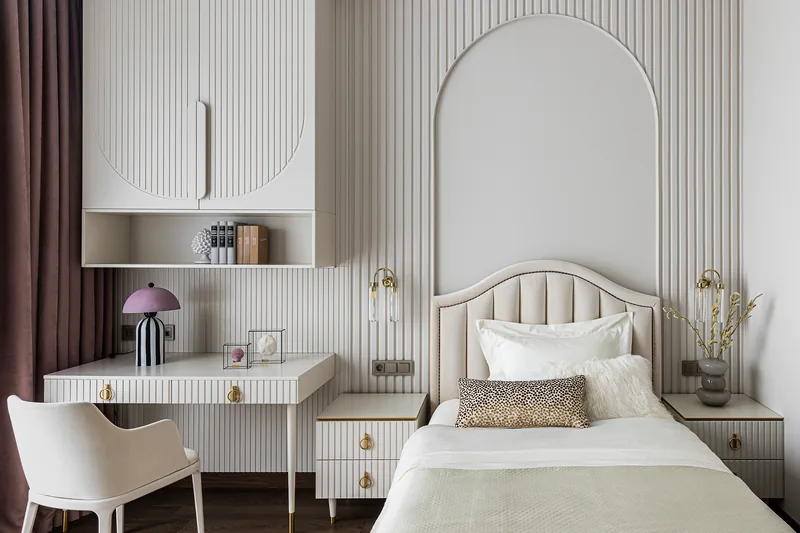 Girl's bedroom: wall slats, arched cabinet, desk and bed