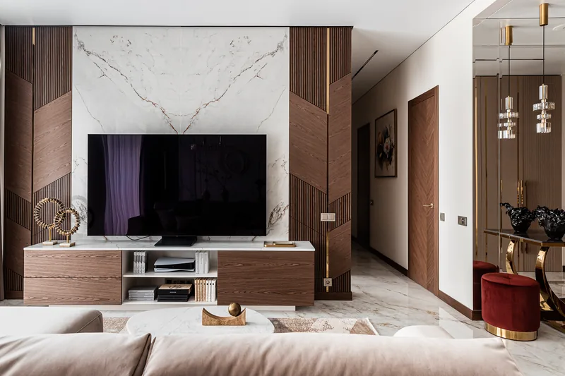 TV area and sofa — view from the living room to the hallway