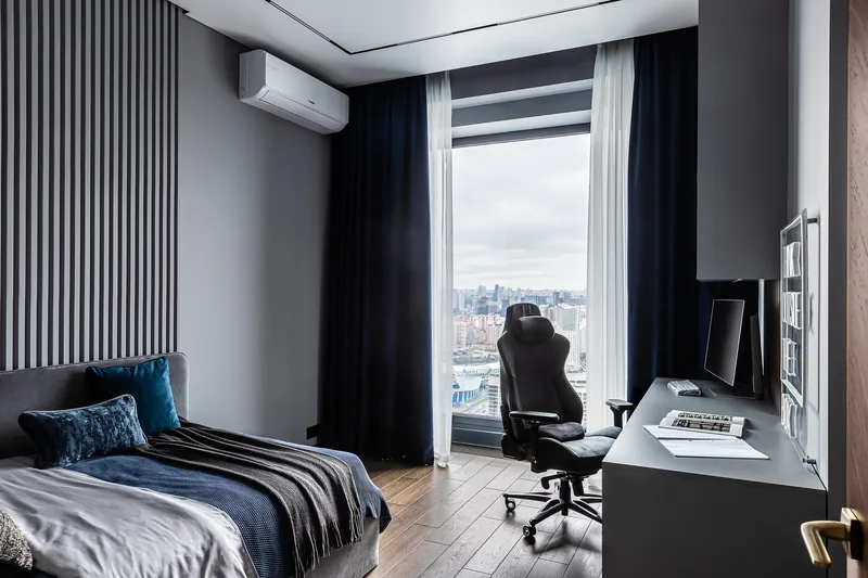 Teenager's room: bed, workstation by the window and wardrobes