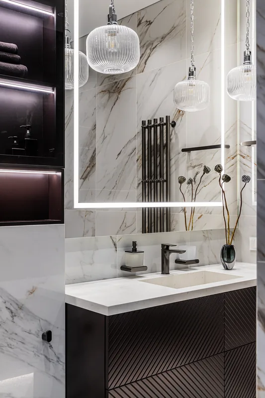 Wall-mounted vanity with dark fronts