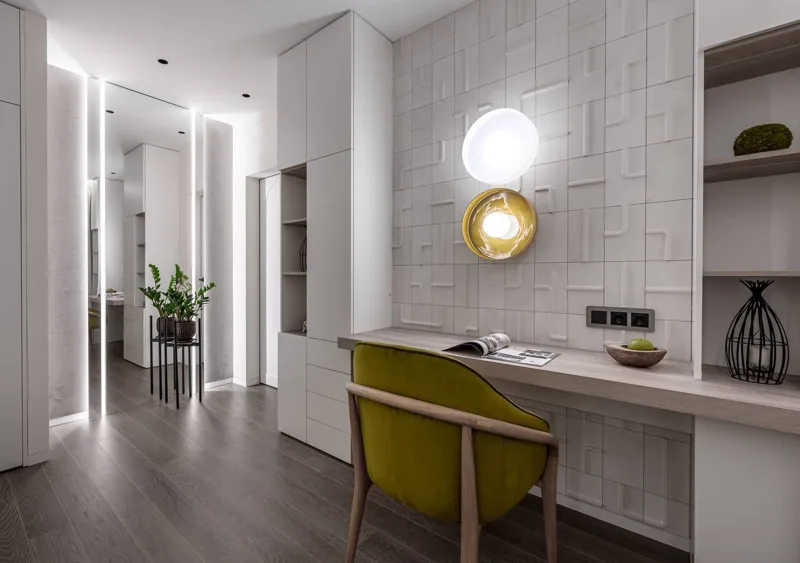 Workspace: console table, surrounding cabinets and shelves, textured wall